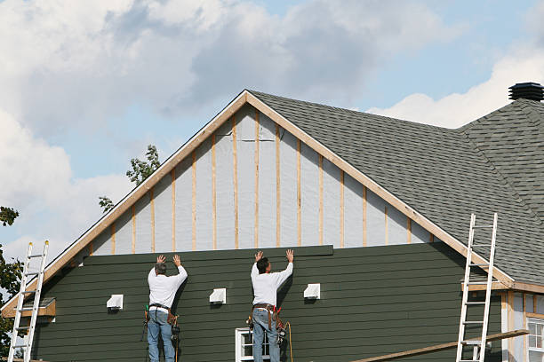 Professional Siding Contractor technician working in Troutman, NC